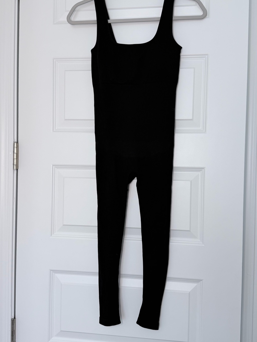 Sleek Black Scoop-Neck Sleeveless Jumpsuit